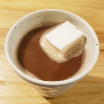 Image of a Homemade Marshmallow melting in a cup of cocoa