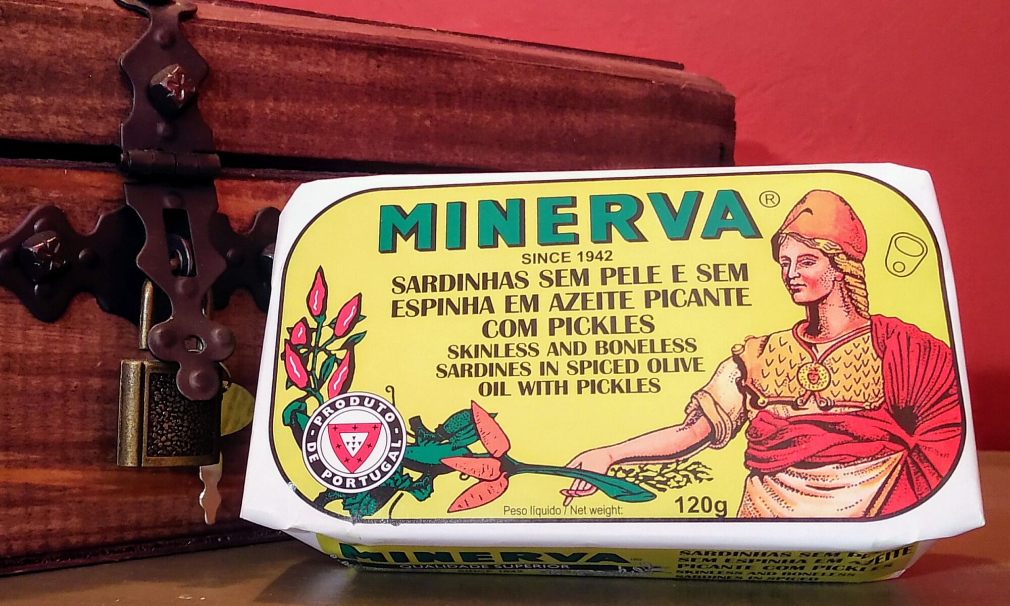 Image of the front of the packaging for Minerva Skinless and Boneless Sardines in Spiced Olive Oil with Pickles