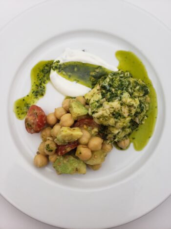 Image of El Capricho sturgeon dressed with herb pesto with moroccan chickpea salad and chive creme fraiche
