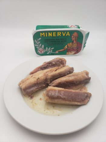 Image of Minerva skinless boneless sardines in olive oil on a plate