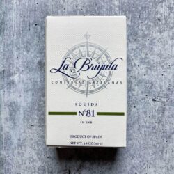 Image of the front of the package of La Brújula Squids in Ink
