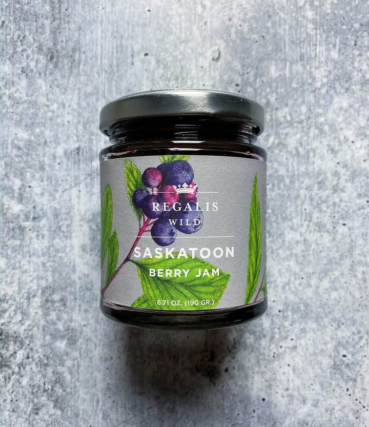 Image of the front of a jar of Wild Saskatoon Berry Preserves