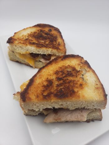 Image of grilled cheese with Ortiz bonito del norte and mango chutney