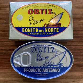 Image of the outer package and a closed tin of Ortiz Family Reserve Bonito del Norte in Extra Virgin Olive Oil