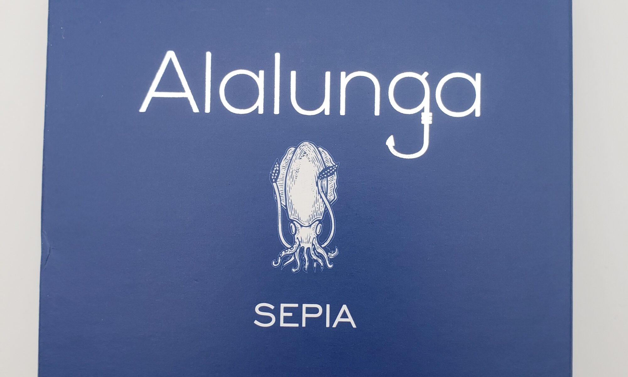 Image of Alalunga cuttlefish in its own ink