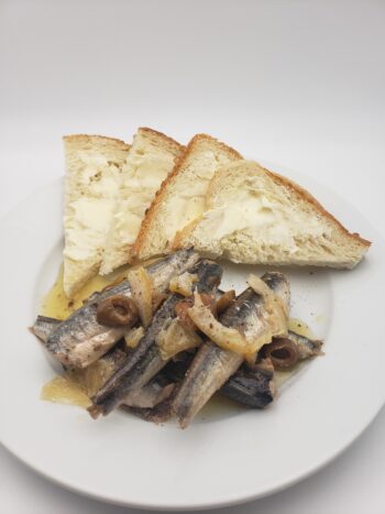 Image of Patagonia lemon olive anchovies with buttered bread