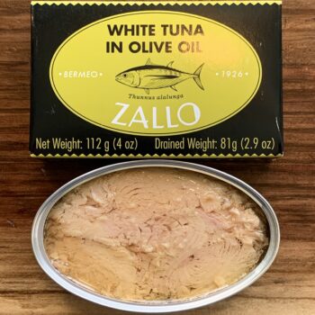 Image of the front of a package and an open tin of Zallo Bonito del Norte in Olive Oil