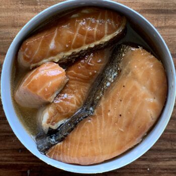 Image of an open tin of Wildfish Cannery Smoked King Salmon