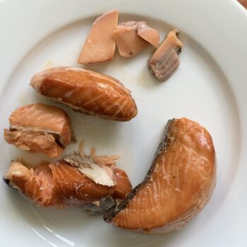 Image of the plated contents of a tin of Wildfish Cannery Smoked King Salmon