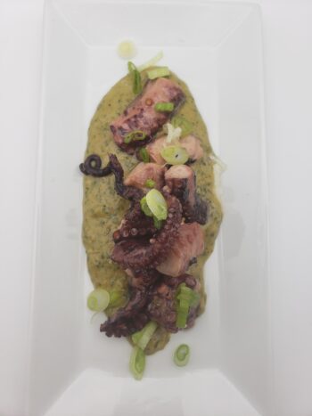 Image of Jose Gourmet spiced octopus plated with salsa verde