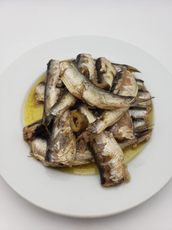 Image of King Oscar royal sardines with manzanilla olives on plate