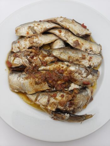 Image of King Oscar royal sardines with red bell pepper on plate