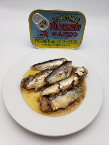 Image of Pollastrini di Anzio Spiced Sardines plated tin contents