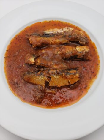 Image of Pollastrini sardines with spicy tomato sauceon plate