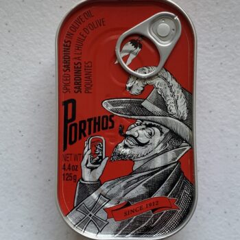 Image of the front of a tin of Porthos Spiced Sardines in Olive Oil 3/5