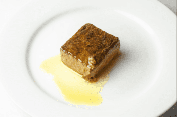 Image of the plated contents of a tin of Güeyu Mar Chargrilled Red Tuna Ventresca