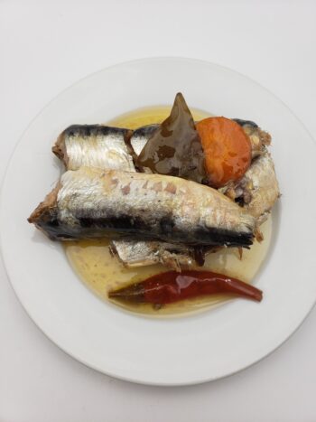 Image of Flower brand spiced sardines on plate