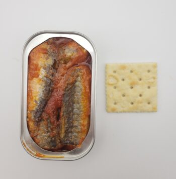 Image of Flower Moroccan Sardines in Tomato Sauce open tin with saltine