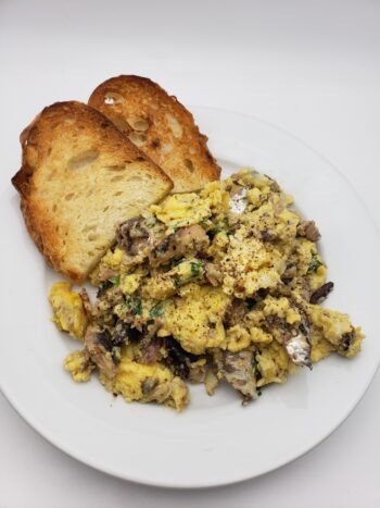 Image of Flower brand spiced sardines with scrambled eggs and toast