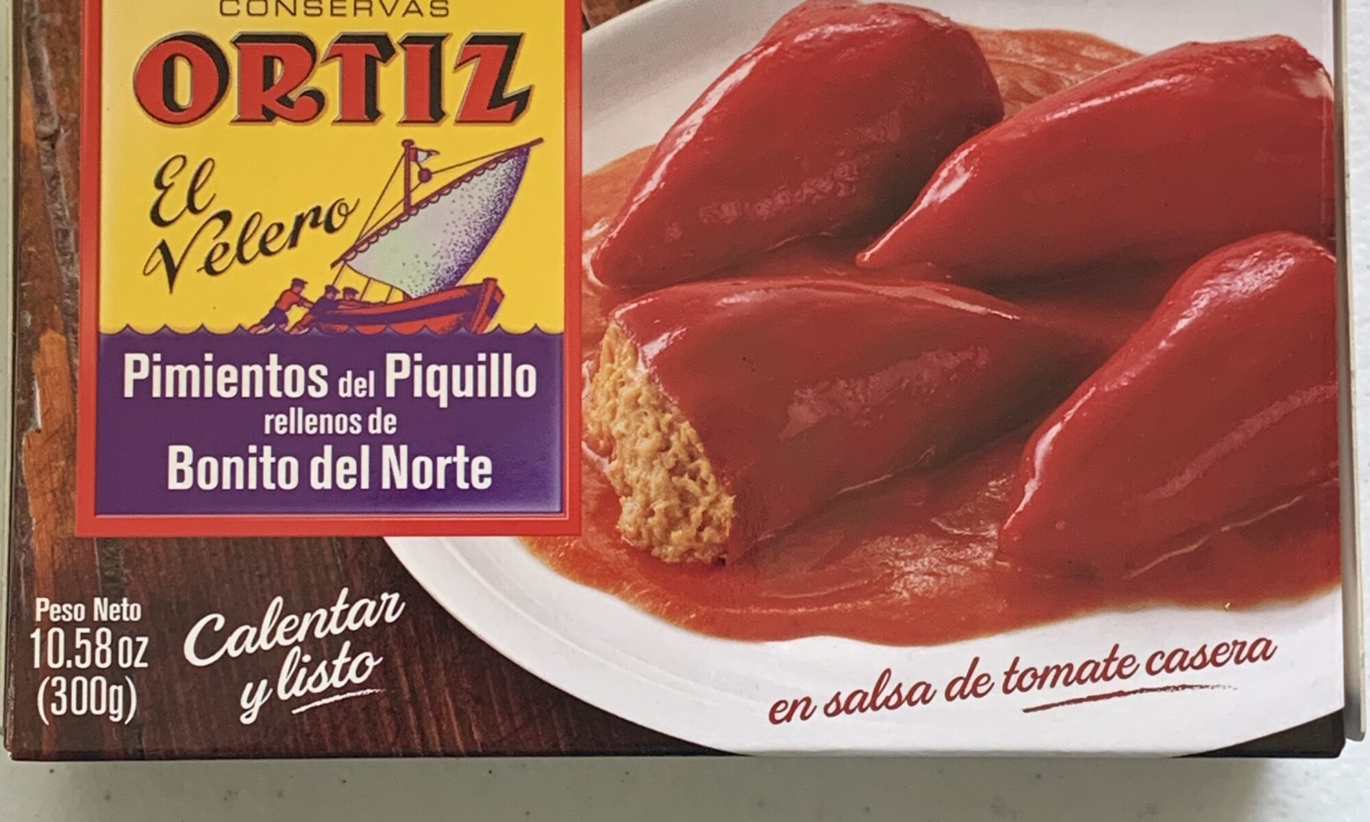 Image of the front of a package of Ortiz Sweet Piquillo Peppers stuffed with White Tuna (Bonito del Norte)