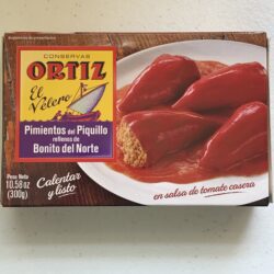 Image of the front of a package of Ortiz Sweet Piquillo Peppers stuffed with White Tuna (Bonito del Norte)