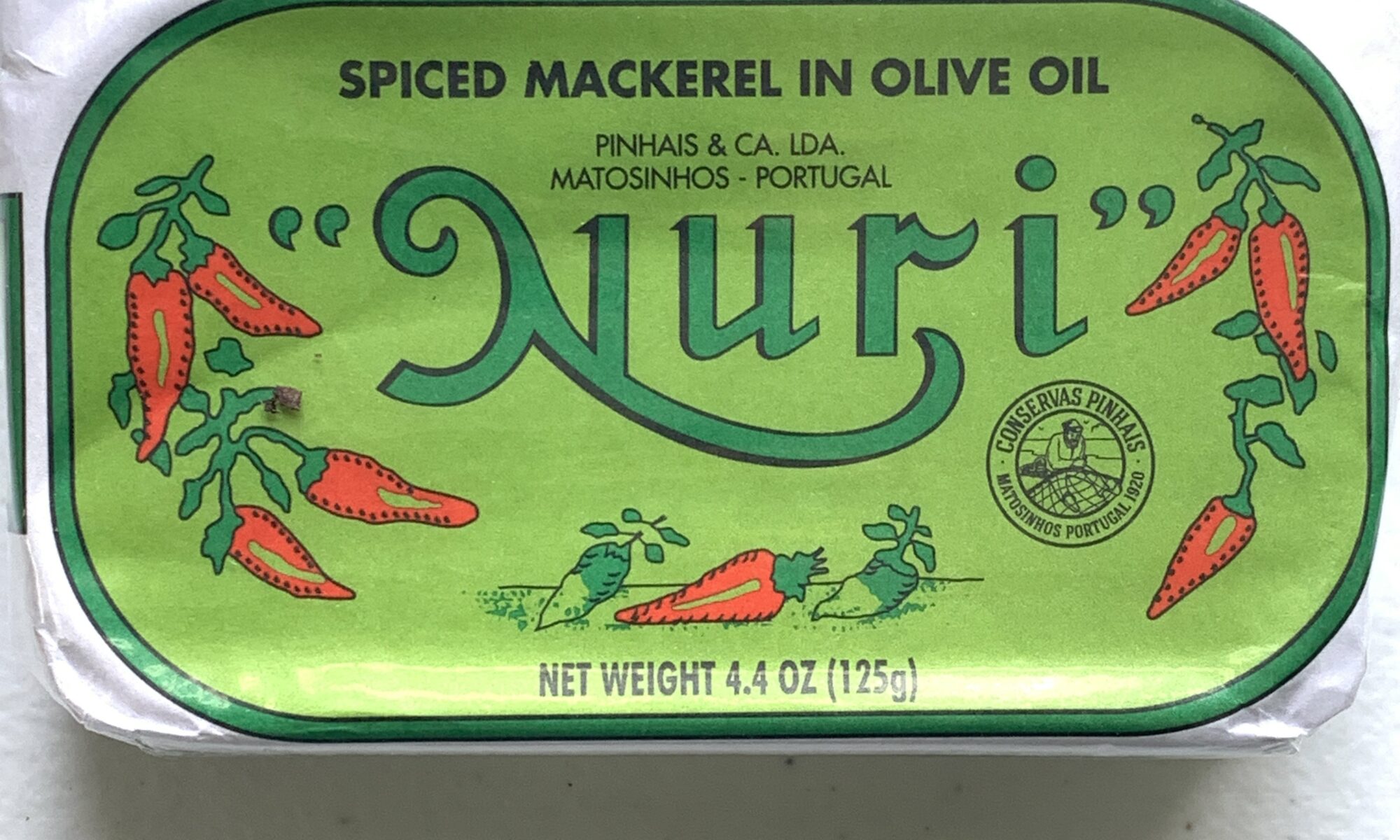 Image of the front of a tin of Nuri Spiced Mackerel in Olive Oil