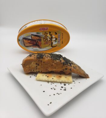 Image of Nissui Sardines in Miso tin plated with kelp sprinkle