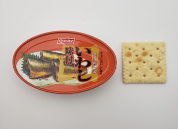 Image of Nissui Sardines in Sweet Soy tin with saltine