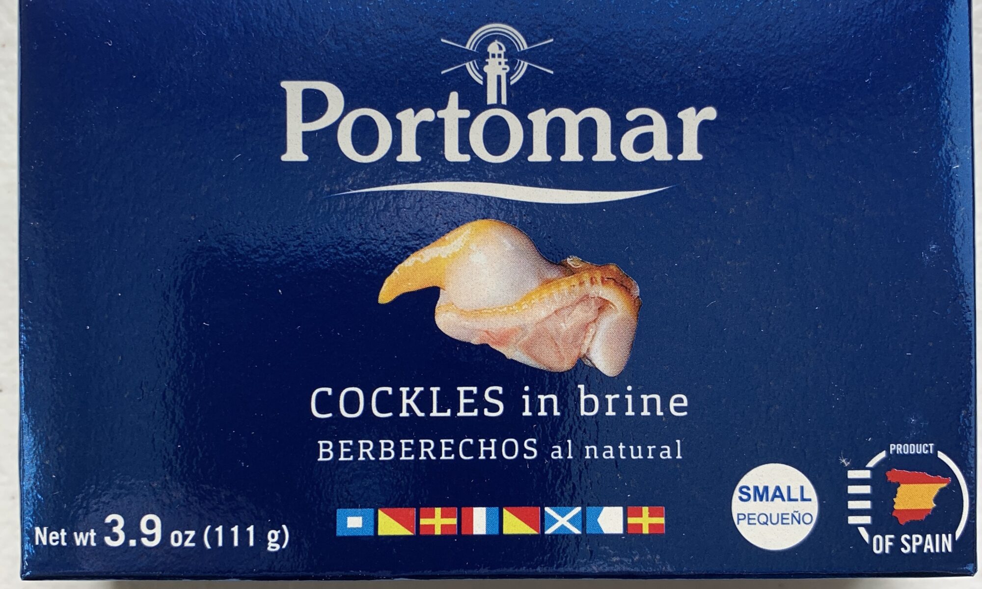 Image of the front of a package of Portomar Cockles in Brine 50/60