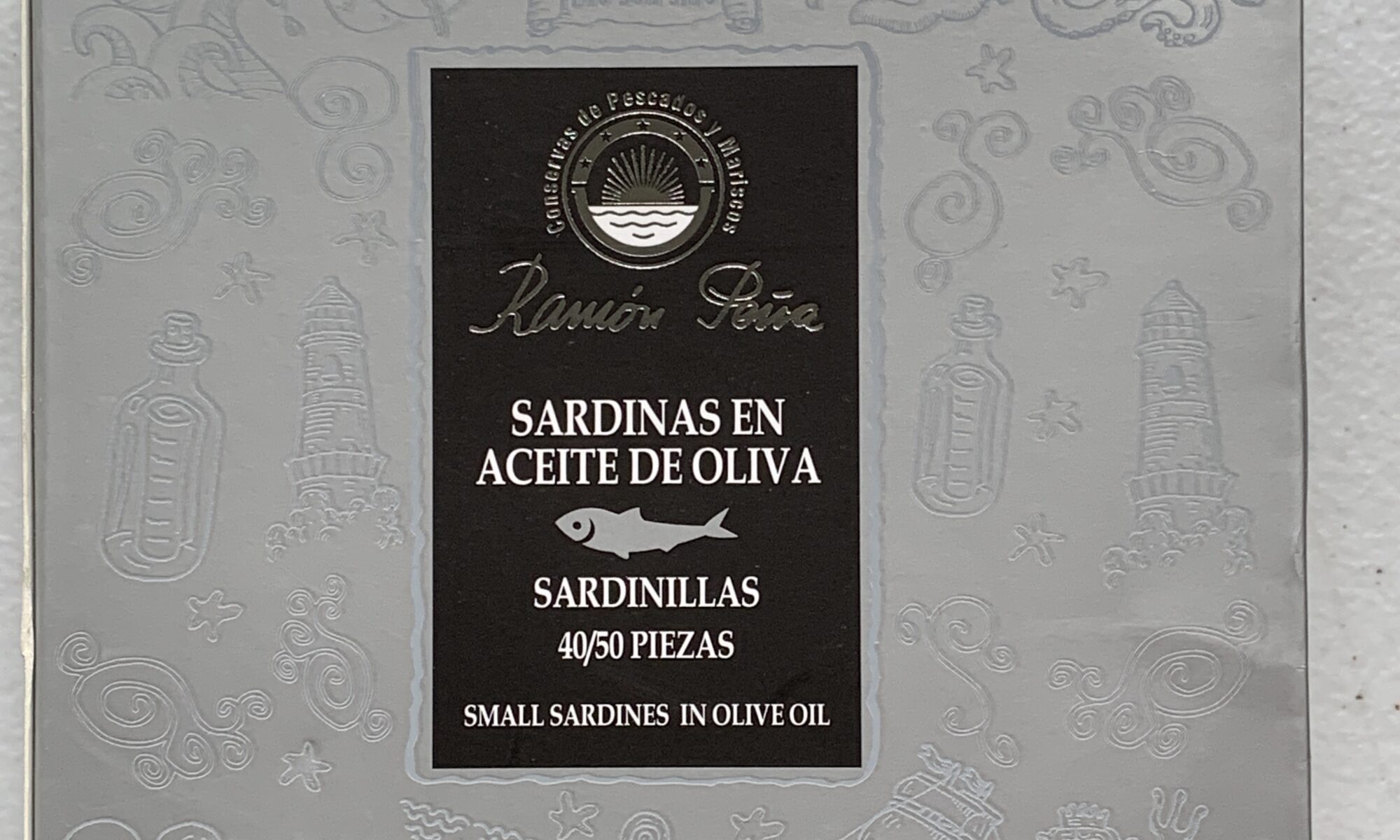 Image of the front of a package of Ramón Peña Small Sardines in Olive Oil 40/50, Large Format