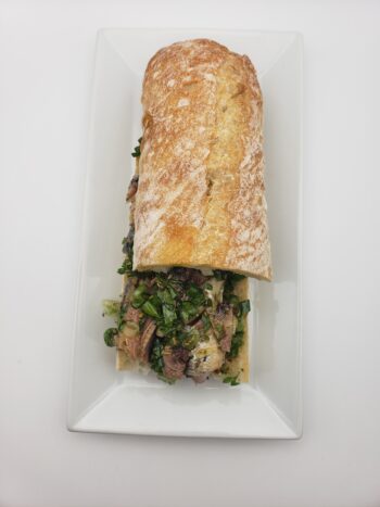 Image of Maria Organic sardines in olive oil on baguette with herbs and olive oil
