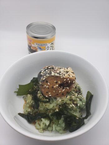 Image of Nissui mackerel in miso on bamboor rice with wakame and sesame seeds