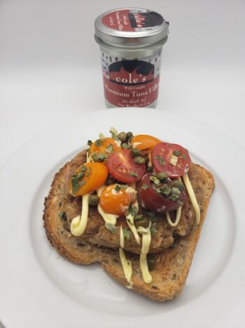 Image of Coles Tuna in Olive oil as a paty on toast with tomatoes and chives