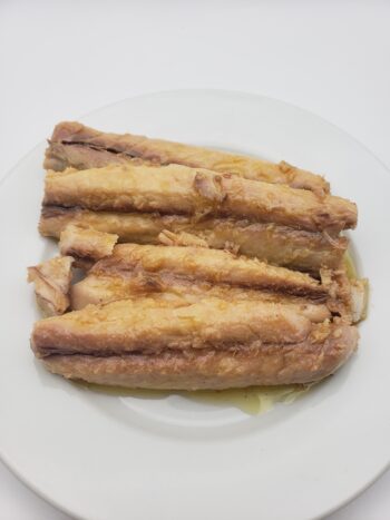 Image of MInerva mackerel in olive oil on plate