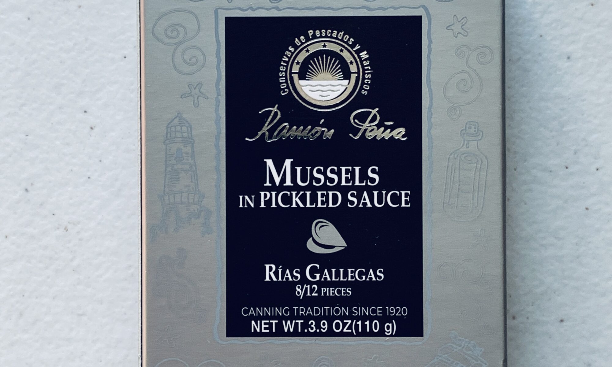 Image of the front of a package of Ramón Peña Mussels in Escabeche 8/12, Silver Line