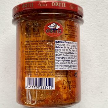 Image of the back of a jar of Ortiz White Tuna in Olive Oil with Espelette Pepper, glass jar