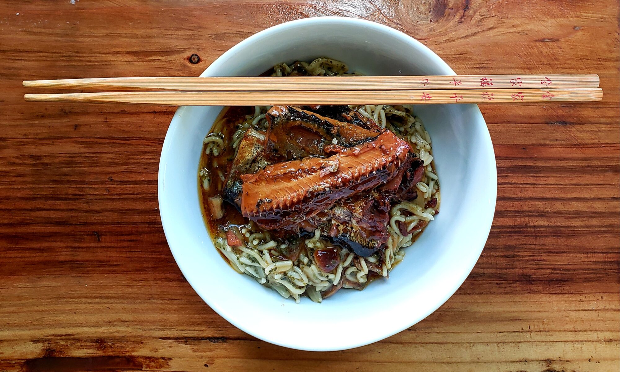 Image of a bowl of Fish Dish: Broiled Seasoned Saury, Onion, and Kelp Ramen
