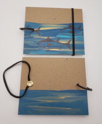 Image of handmade tuna book with elastic closure back