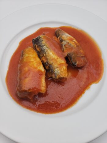 Image of bon appetit sardines with hot tomato sauce on plate
