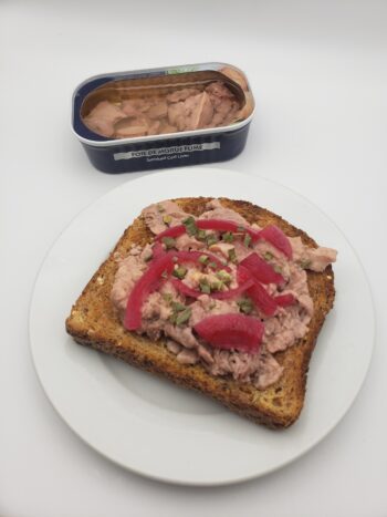 Image of Officer Foie de Morue cod liver on toast with pickled onion