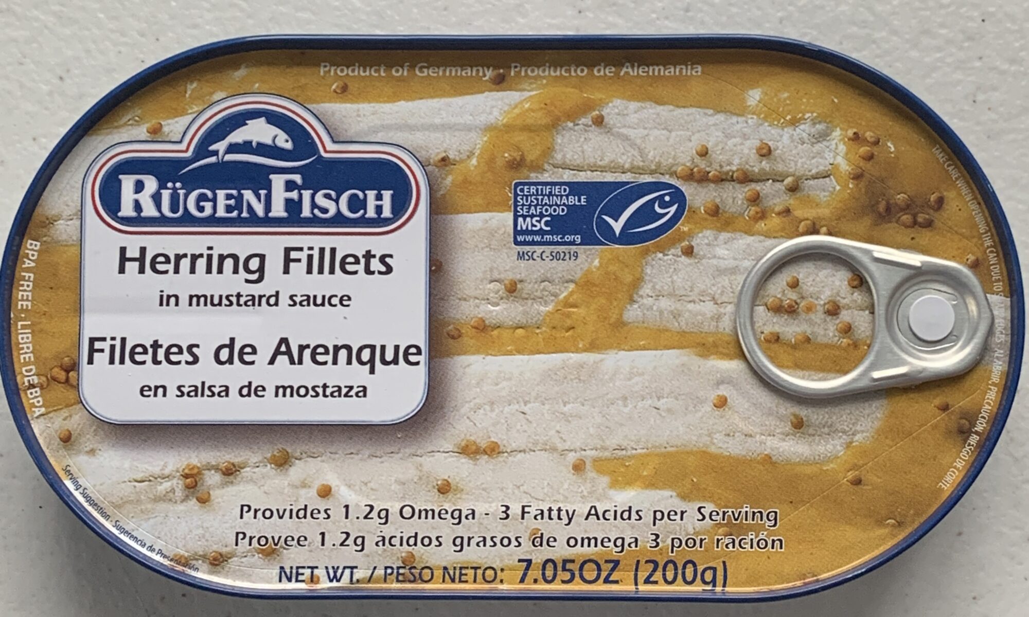 Image of the front of a tin of Rügen Fisch Herring Fillets in Mustard Sauce