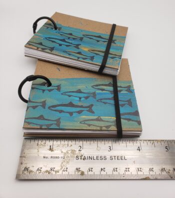 Image of handmade fish book with elastic closure with ruler