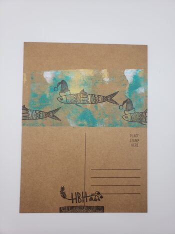 Image of santa sardine postcards hand printed with back