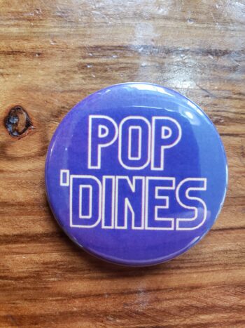 Image of pop dines purple button