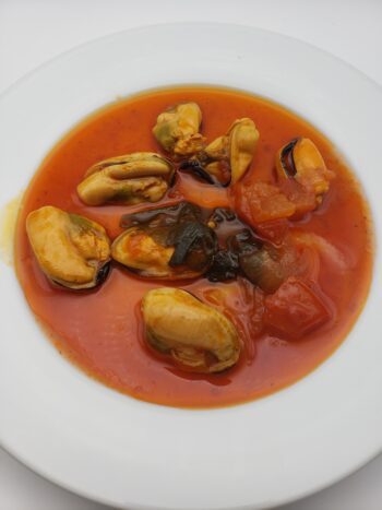 Image of Porto Muinos mussels with sweet kombu and salva brava on plate