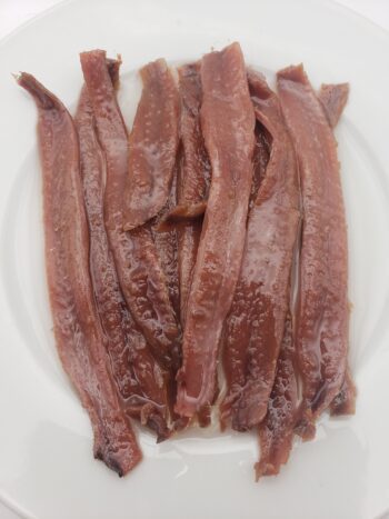 Image of El Capricho anchoviesin sunflower oil filets on plate