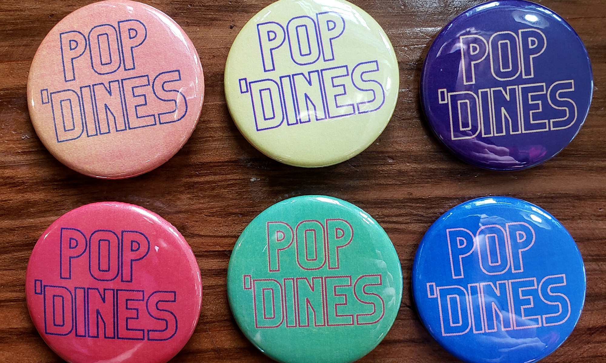 Header image of pop 'dines button set