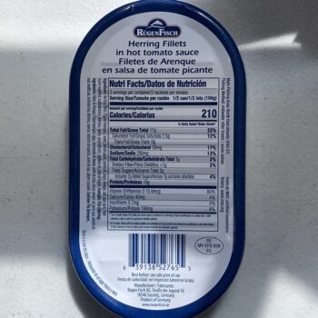 Image of the back of a tin of Rügen Fisch Herring Fillets in Hot Tomato Sauce