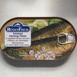 Image of the front of a tin of Rügen Fisch Smoked Herring Fillets in Canola Oil and Own Juice