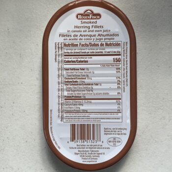 Image of the back of a tin of Rügen Fisch Smoked Herring Fillets in Canola Oil and Own Juice